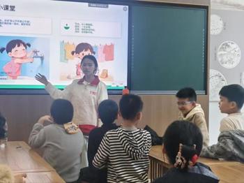 旅游与商贸学院开展“惜水护气象，童心守家园”志愿服务活动